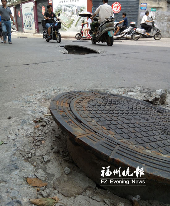 200米路面18個窨井蓋“探頭” 市政：將盡快修復
